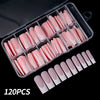 A clear plastic box filled with 120 nude pink matte French press on nails arranged in rows.