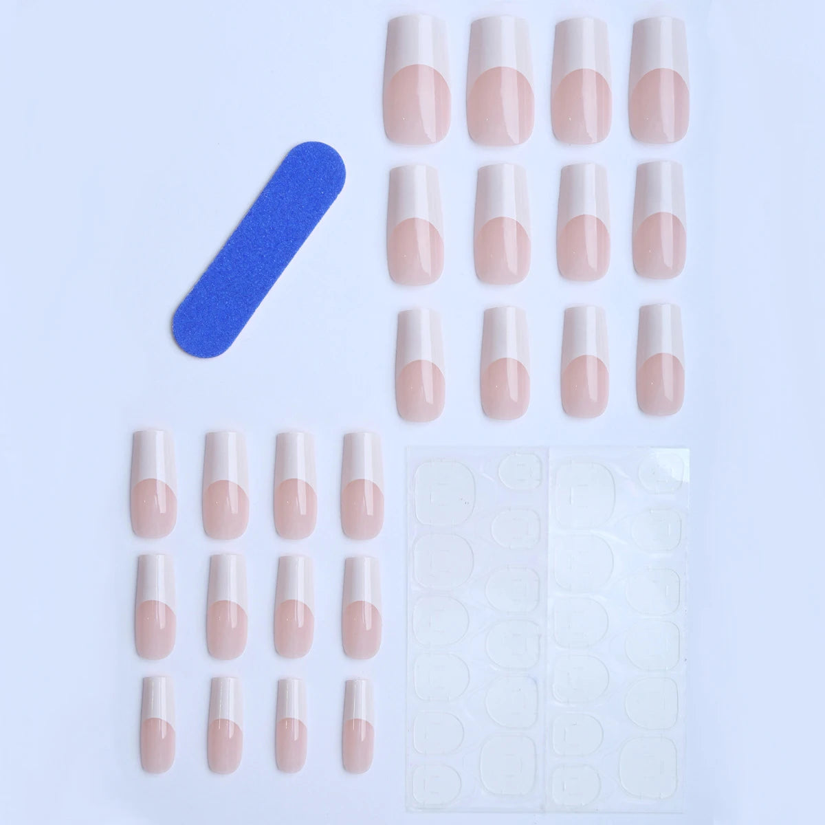 A collection of 24 white French style press-on nails in coffin shape displayed on a white background.