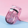 A pink mini folding eyelash curler set with a black accent, shown against a light background.
