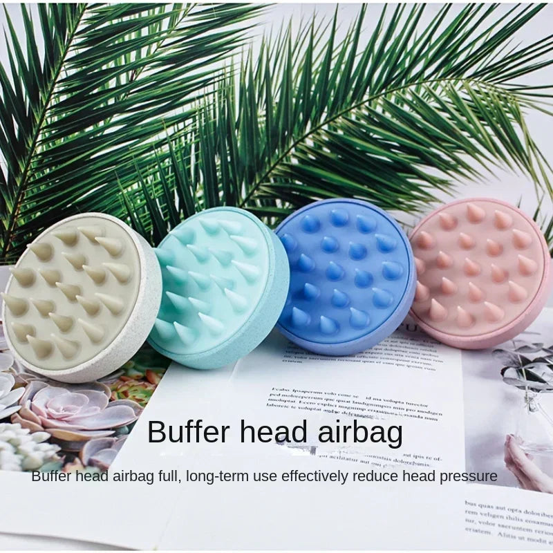 A pink buffer head airbag is shown next to a light blue and a blue one, with palm leaves in the background.