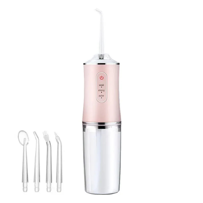 A pink and silver portable oral irrigator dental water flosser device.