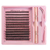 Pink tray containing a DIY lash extension kit with bond, seal, and remover tools.