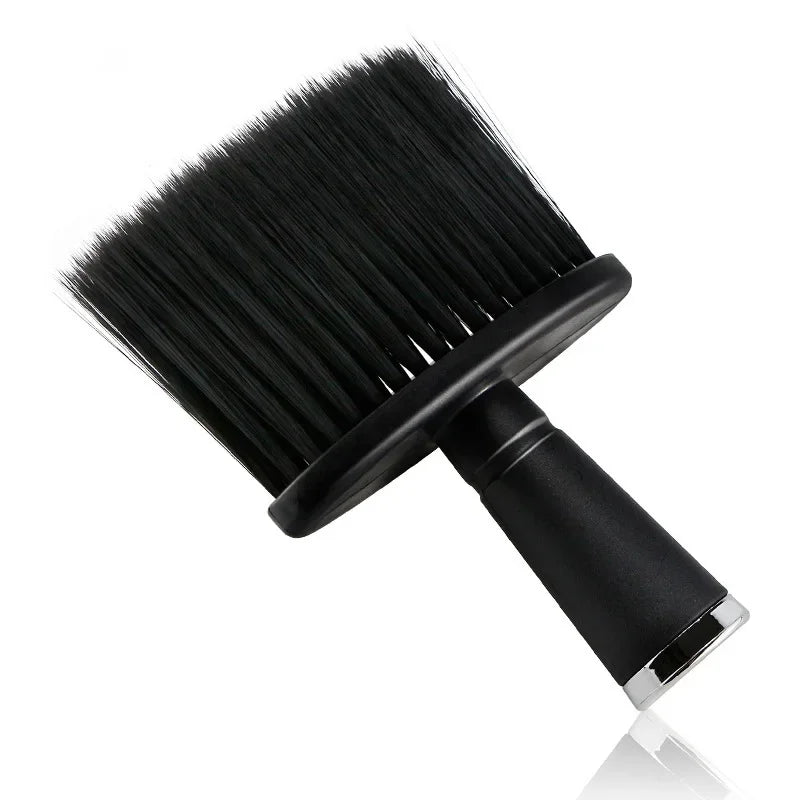 A black soft bristle hair duster brush used for salon and barbershop work.