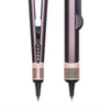 A pair of professional hair straighteners and dryers in a rose gold color shown vertically.