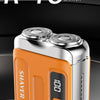 An orange and silver Witzio shaver R-18 is shown on a dark surface.