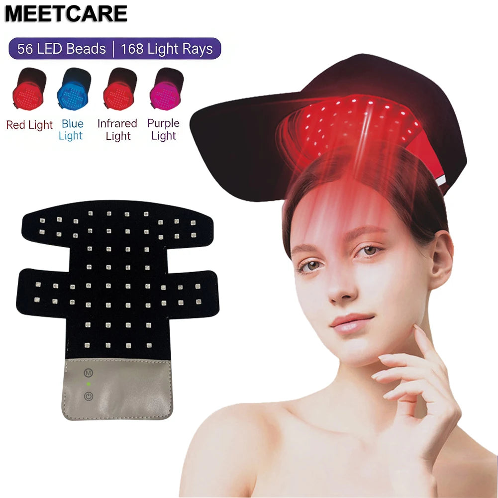 A woman is wearing a black scalp massager cap designed for LED light therapy, with various colored light options visible.