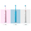 Tres versiones de una cepillo de dientes eléctrico ultrasónico en rosa, azul y blanco.