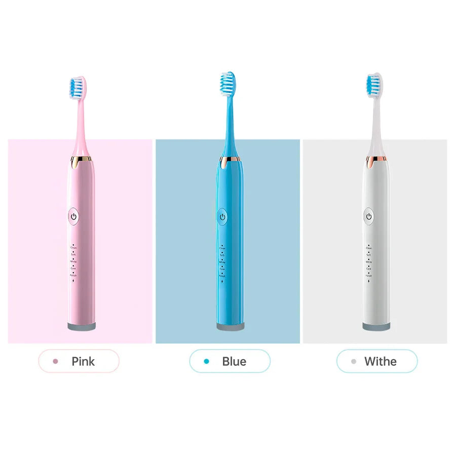 Tres versiones de una cepillo de dientes eléctrico ultrasónico en rosa, azul y blanco.