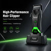 A black Kemei high-performance hair clipper with a green blade and LED display resting on a dark surface.
