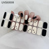 A hand displays various Halloween UV gel nail stickers on fingernails, featuring glitter and black designs.
