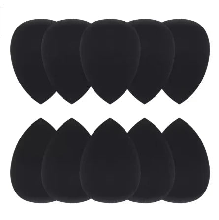 A set of nine black multifunctional makeup brushes laid out in a row.