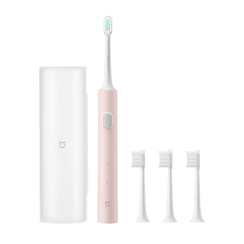 A white sonic electric toothbrush with a pink handle and multiple brush heads shown in various configurations.
