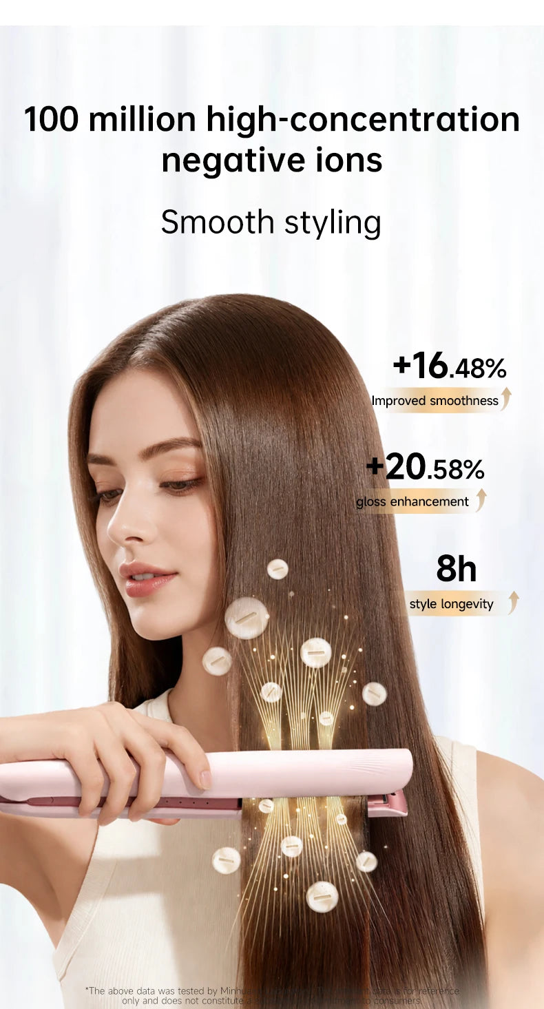 A woman is using a pink steam flat iron to style her long, dark hair.