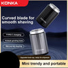 A black Konka electric shaver with a curved blade, shown against a dark background.