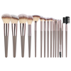A set of various makeup brushes with fluffy and dense bristles displayed in a row.