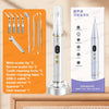 A silver ultrasonic dental scaler device with various tips and accessories displayed on a wooden surface.