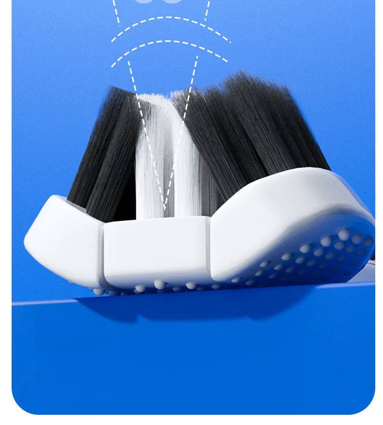 A U-shaped 3D toothbrush set with black and white bristles is shown resting on a blue surface.