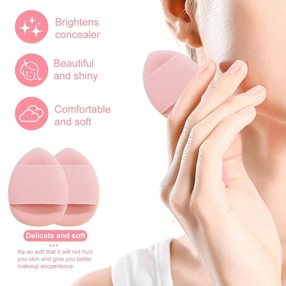 A hand applies a pink silicone makeup concealer tool to the skin, highlighting its delicate and soft texture.