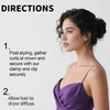 A woman with dark curly hair is shown in a close-up, demonstrating two steps for styling hair using lifting clips and a diffu