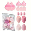 A set of pink beauty sponges and applicators packaged in a clear plastic bag.