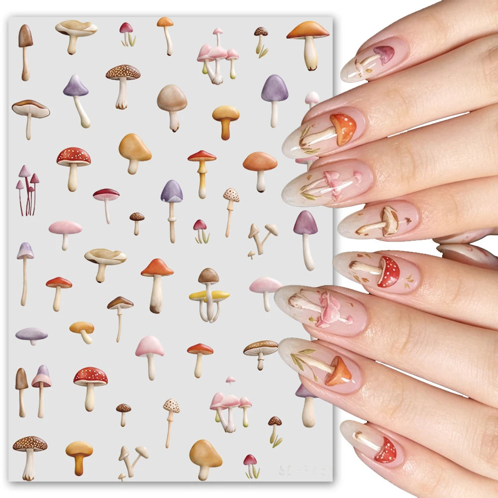 A close-up of a hand displaying various watercolor mushroom nail art stickers on fingernails.