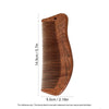 A wooden scalp and hair comb with fine teeth, showing the natural wood grain and design.