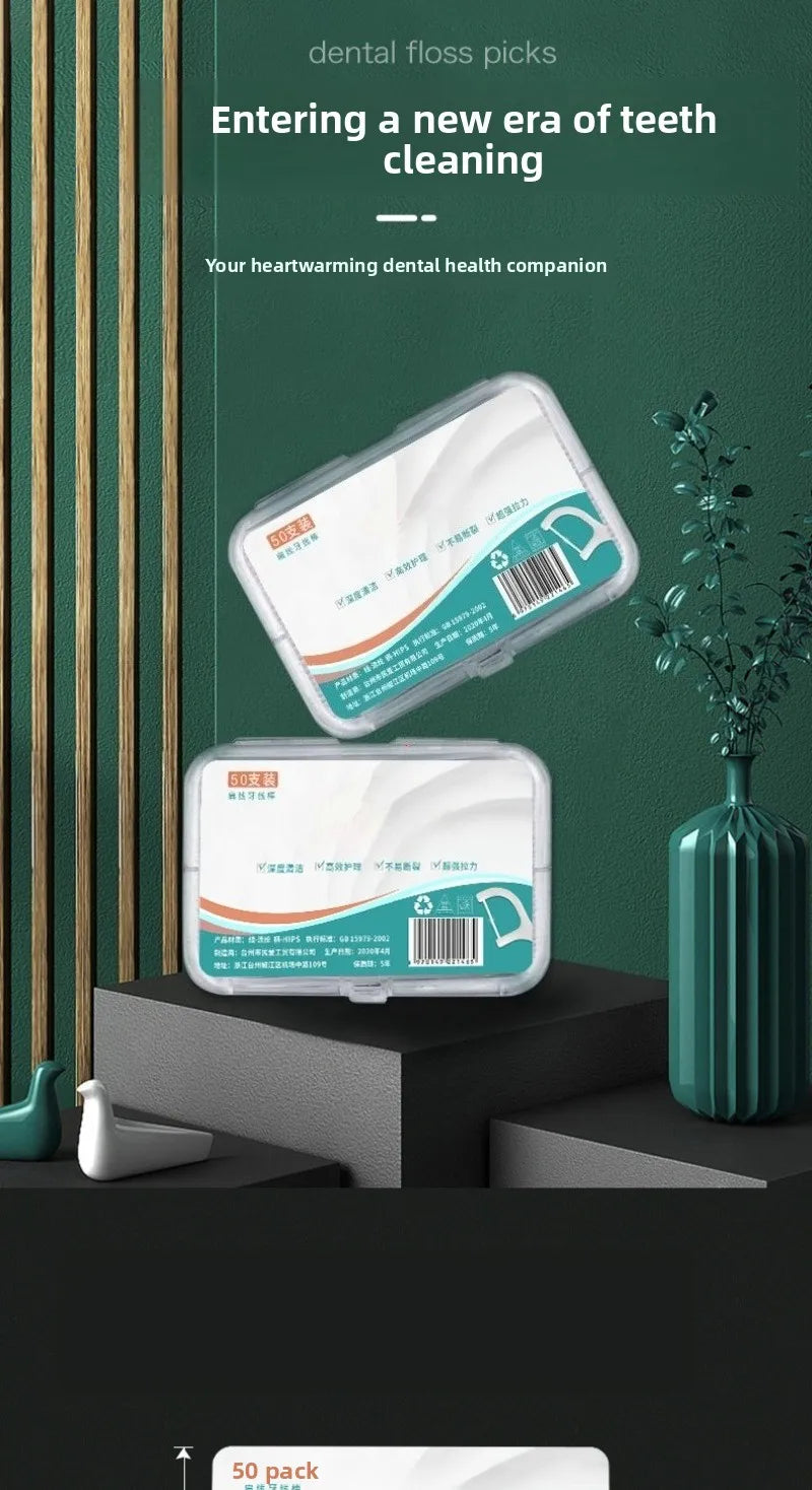 Two clear plastic containers of dental floss picks are displayed on a dark surface with green and gold accents.