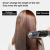 A close-up view of a professional cordless hair trimmer being used on the back of a person's hair.