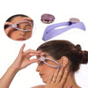 A woman is using a purple precision spring-action facial hair remover device on her face.