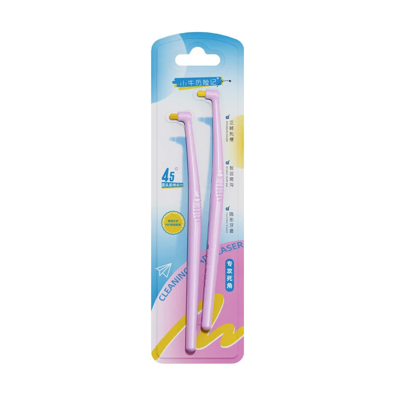 Un paquet contenant deux brosses interdentaires roses pour le nettoyage des dents de sagesse.