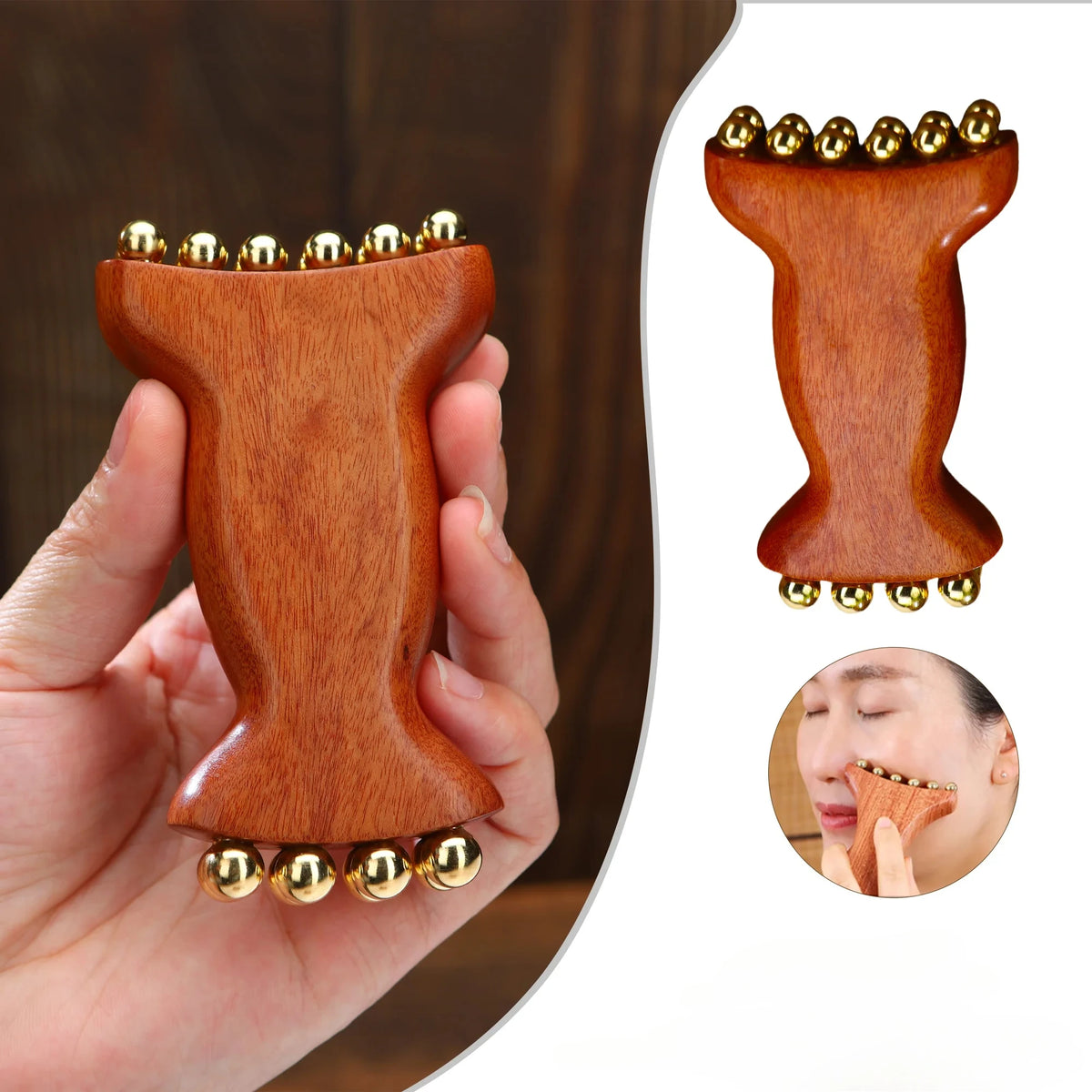 A hand holds a natural wood facial and scalp massage comb with gold-tipped bristles.