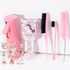 A pink unicorn themed hair styling kit featuring a blow dryer, brush, and comb.
