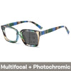 Pair of photochromic multifocal reading glasses with a green and blue plaid frame.