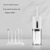 Elegant white electric water flosser with a five nozzle function set displayed next to the main unit.