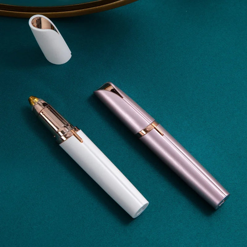 A precision electric eyebrow trimmer in pink and white is shown against a teal background.