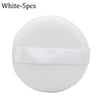 White makeup puffs with a satin ribbon band for concealer and powder application