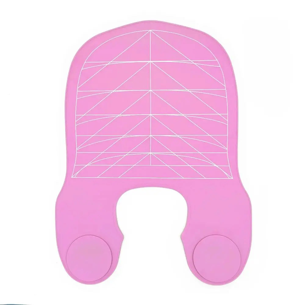 A pink reusable silicone hair dyeing cape with a cutting collar.