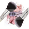 A set of professional makeup brushes featuring various shades of pink and purple powder on a white background.