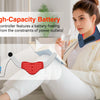 A woman is wearing a red light therapy belt while relaxing indoors.