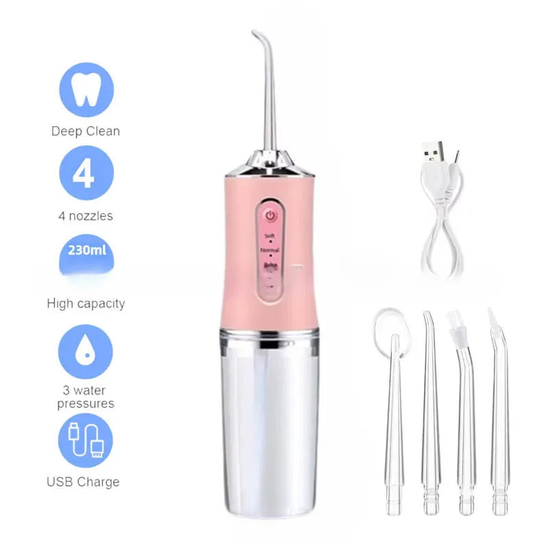 A pink and silver portable USB rechargeable dental water flosser with four nozzles and accessories.