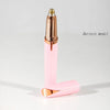 A pink and gold electric eyebrow trimmer and epilator device standing upright on a white surface.