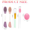 A set of silicone facial cleansing brushes and mask applicators in purple, pink, and green colors with various sizes.