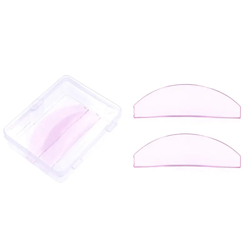 Zwei klare Silikon-Lash-Perm-Pads zum Locken von Wimpern, eine pink und eine klar.