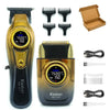 A set of Kemei KM-T228 hair clippers, including the main body, attachments, and charging cable.