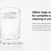 A clear glass water tank used for an electric oral irrigator.