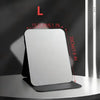 A white foldable portable makeup mirror is shown against a dark background with dimension markings.