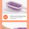 A purple wheat straw massage comb with rounded teeth is shown on a white background.