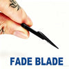 A hand holds a black fade blade hair clipper blade, showing the sharp edge and size.