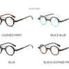 Un ensemble de lunettes rondes dans diverses couleurs, dont noir, bleu et motifs léopard noirs.