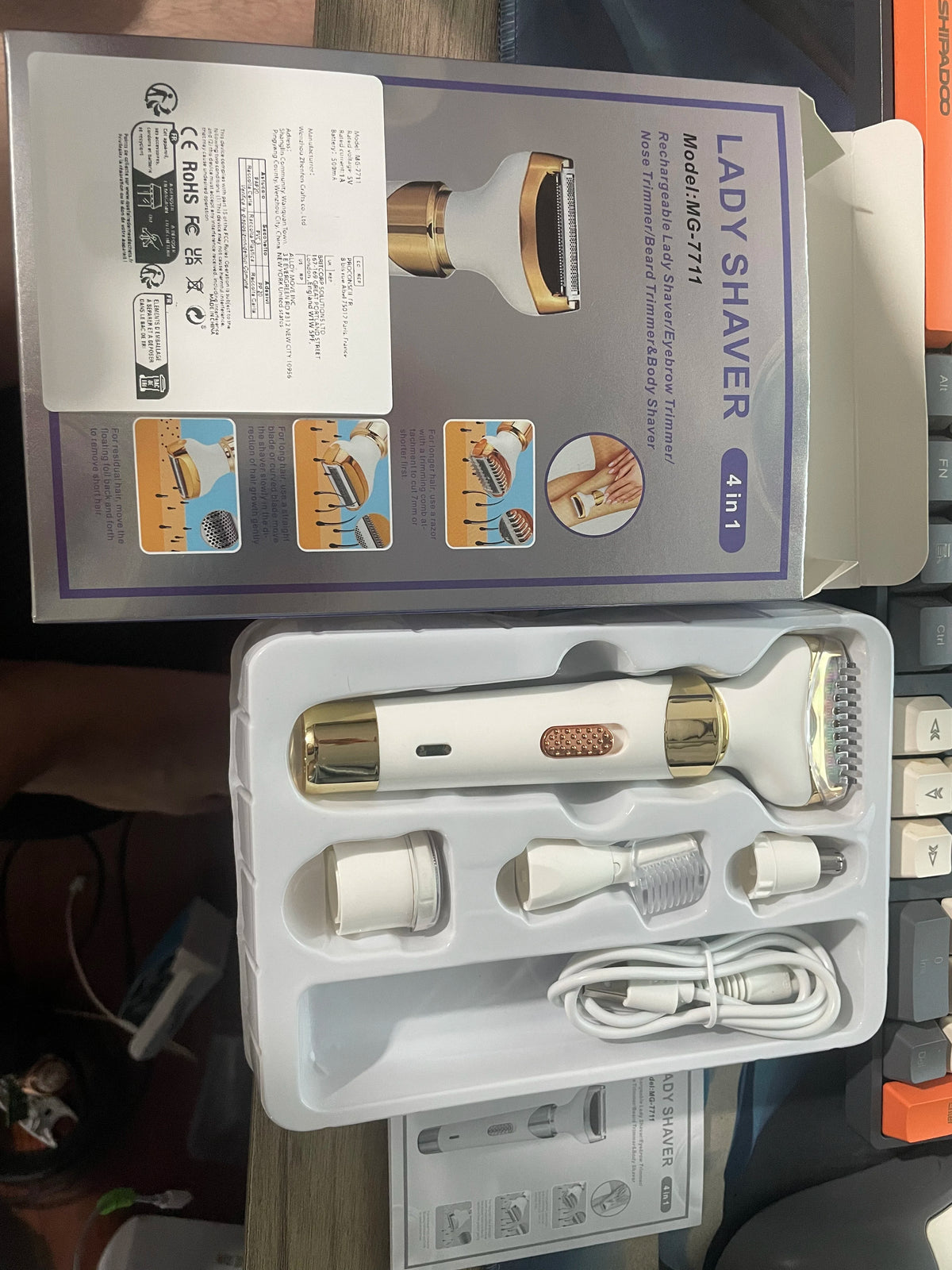 Eine Box und Komponenten für ein Lady Shaver Modell MG7711 elektrisches Haarentfernungsgerät.